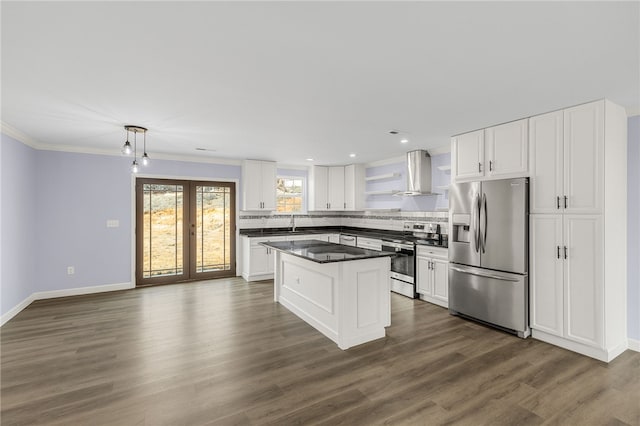 11 Arlington Rd, Greer, SC 29651 - kitchen featuring stainless steel appliances, wall chimney range hood, dark countertops, dark wood-type flooring, and white cabinetry