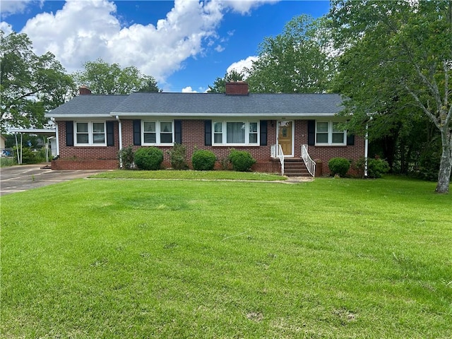 502 Cheyenne St, Anderson, SC 29626 - ranch-style house featuring a chimney, brick siding, and a front yard