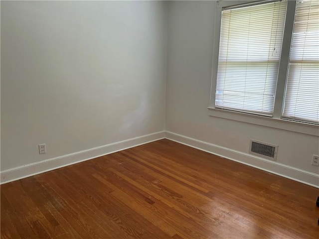 502 Cheyenne St, Anderson, SC 29626 - empty room featuring baseboards and dark wood-style flooring
