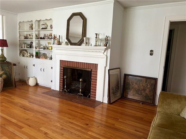 502 Cheyenne St, Anderson, SC 29626 - unfurnished living room with a fireplace, wood finished floors, and crown molding
