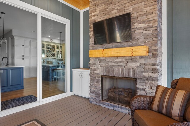 656 Bark Shed Trl, Seneca, SC 29672 - living room featuring wood finished floors and a stone fireplace