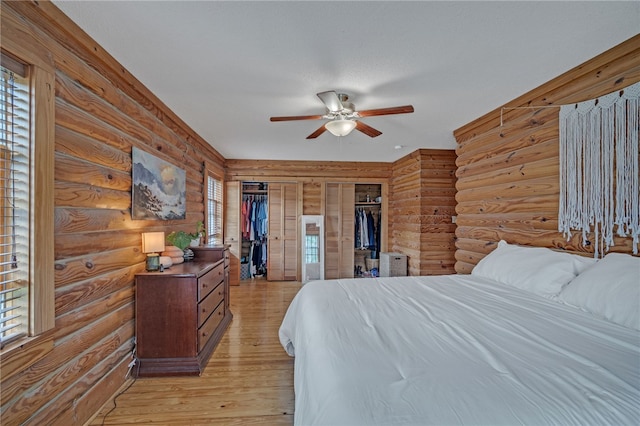 60 Lakeside Dr, Lyman, SC 29365 - bedroom featuring rustic walls, light wood-type flooring, and ceiling fan