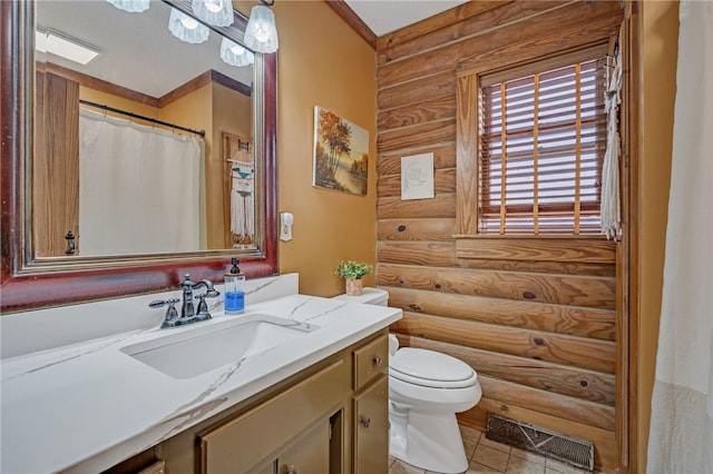 60 Lakeside Dr, Lyman, SC 29365 - full bath featuring log walls, toilet, vanity, and tile patterned floors
