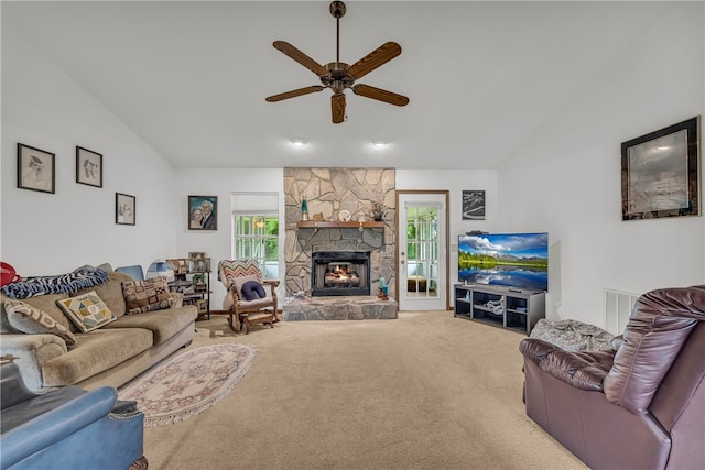 211 Jana Dr, Walhalla, SC 29691 - living area featuring carpet floors, vaulted ceiling, a ceiling fan, and a stone fireplace