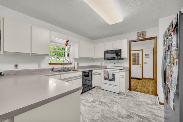 211 Jana Dr, Walhalla, SC 29691 - kitchen with black appliances, a sink, white cabinetry, a textured ceiling, and light countertops