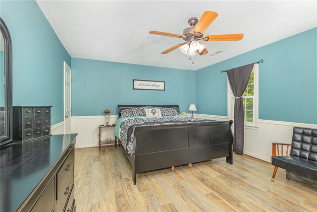 108 Ascot Ct, Easley, SC 29642 - bedroom with a wainscoted wall, light wood finished floors, and ceiling fan