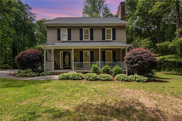 108 Ascot Ct, Easley, SC 29642 - view of front facade featuring a chimney, a porch, and a front yard