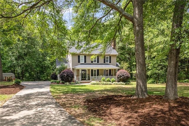 108 Ascot Ct, Easley, SC 29642 - view of front of property with covered porch, a front yard, and driveway