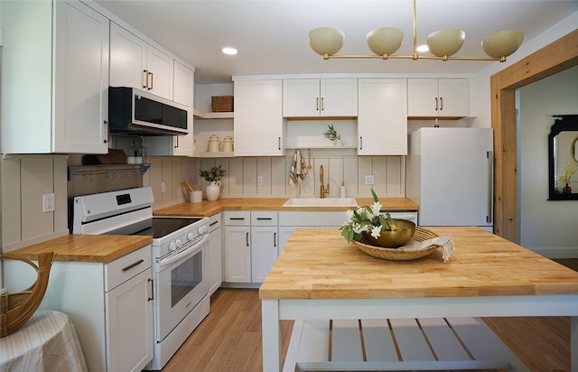202 S Broad St, Westminster, SC 29693 - kitchen featuring wood counters, white appliances, open shelves, a sink, and recessed lighting