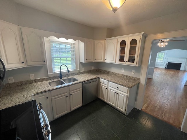 501 Seneca Dr, Seneca, SC 29678 - kitchen featuring dishwasher, a sink, stove, ceiling fan, and plenty of natural light