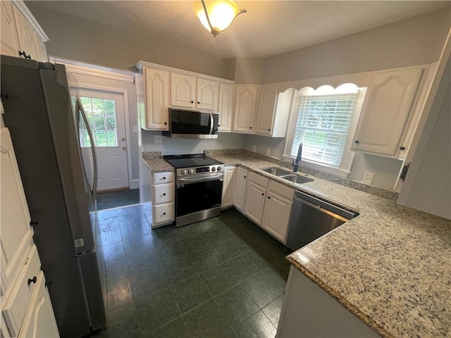 501 Seneca Dr, Seneca, SC 29678 - kitchen with stainless steel appliances, a sink, and white cabinetry