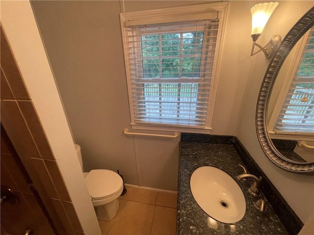 501 Seneca Dr, Seneca, SC 29678 - bathroom featuring tile patterned floors, plenty of natural light, toilet, and vanity
