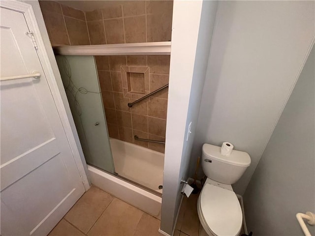 501 Seneca Dr, Seneca, SC 29678 - full bathroom featuring a shower with door, tile patterned floors, and toilet