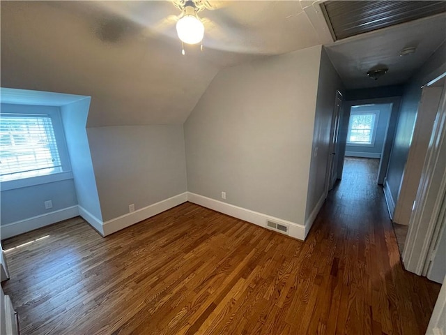 501 Seneca Dr, Seneca, SC 29678 - additional living space with baseboards, a ceiling fan, wood finished floors, and lofted ceiling