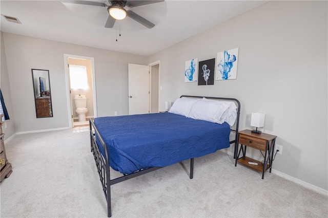 410 S Cove Rd, Seneca, SC 29672 - bedroom featuring light carpet, baseboards, and ensuite bath