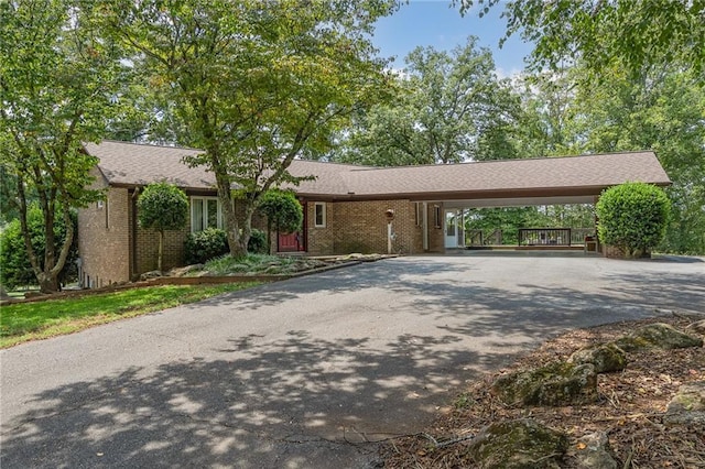 261 N Mcallister Rd, Liberty, SC 29657 - ranch-style home with asphalt driveway, an attached carport, and brick siding