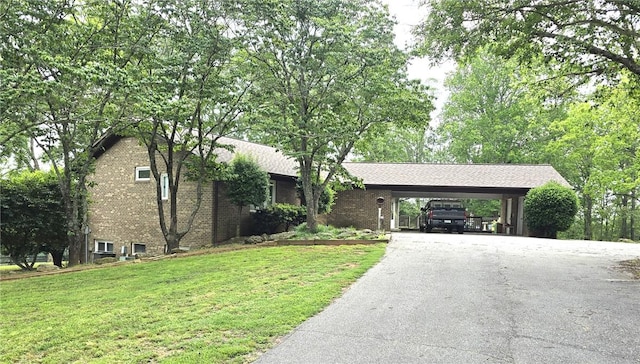 261 N Mcallister Rd, Liberty, SC 29657 - view of front facade featuring driveway, a front lawn, and brick siding