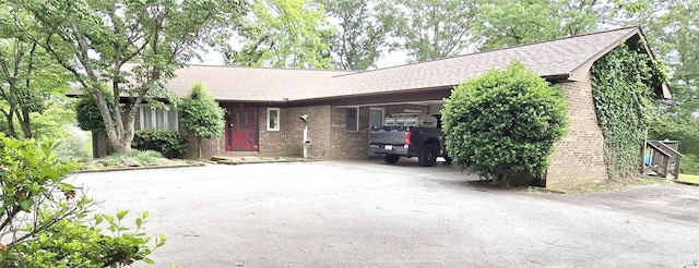 261 N Mcallister Rd, Liberty, SC 29657 - ranch-style house with driveway, brick siding, a shingled roof, and a carport