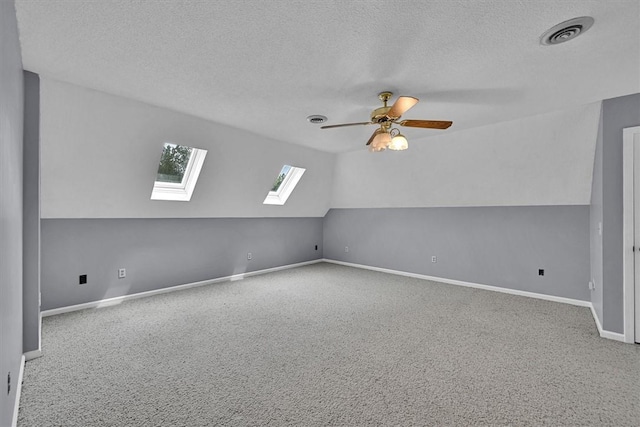 1208 Marett Rd, Pendleton, SC 29670 - additional living space featuring a skylight, carpet, a ceiling fan, a textured ceiling, and lofted ceiling