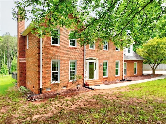 1208 Marett Rd, Pendleton, SC 29670 - back of house featuring a chimney, entry steps, and brick siding