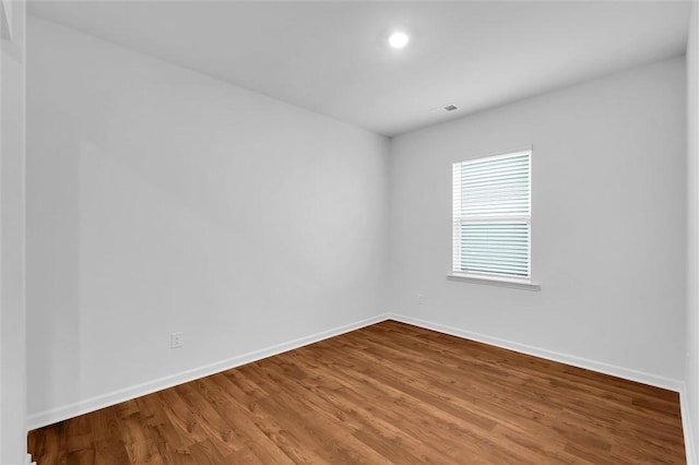 204 Lily Pond Pl, Easley, SC 29642 - unfurnished room with wood finished floors, baseboards, and recessed lighting