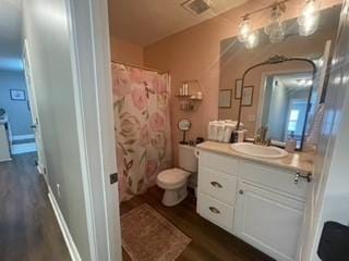 726 Lookover Dr Unit 726, Anderson, SC 29621 - full bathroom featuring wood finished floors, toilet, vanity, and a shower with curtain