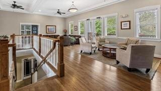 726 Lookover Dr Unit 726, Anderson, SC 29621 - living area with a ceiling fan, wood finished floors, crown molding, beam ceiling, and coffered ceiling