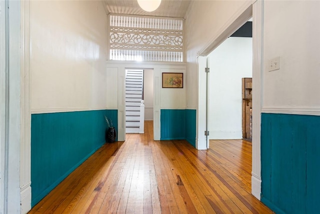 300 S Fairplay St, Seneca, SC 29678 - spare room with hardwood / wood-style floors, a wainscoted wall, and a towering ceiling