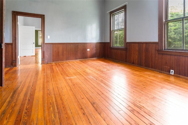 300 S Fairplay St, Seneca, SC 29678 - unfurnished room featuring wainscoting, hardwood / wood-style flooring, and wooden walls