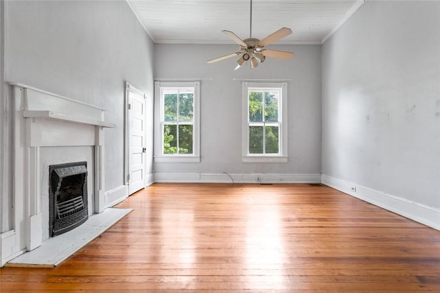 300 S Fairplay St, Seneca, SC 29678 - unfurnished living room with ornamental molding, hardwood / wood-style floors, a ceiling fan, a fireplace with raised hearth, and baseboards