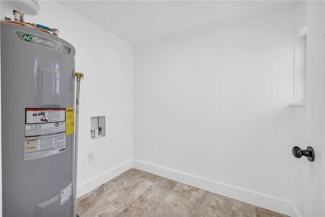 731 E Main St, Seneca, SC 29678 - laundry area with electric water heater, baseboards, and hookup for a washing machine