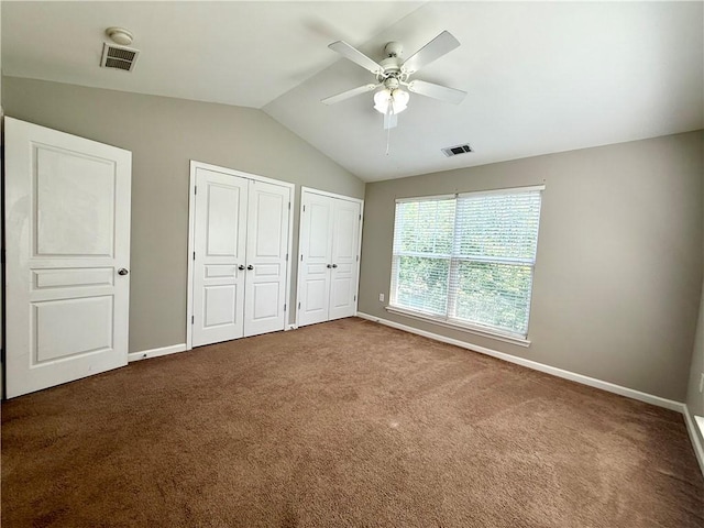 833 Old Greenville Hwy Unit 323, Clemson, SC 29631 - unfurnished bedroom featuring vaulted ceiling, two closets, baseboards, carpet floors, and ceiling fan