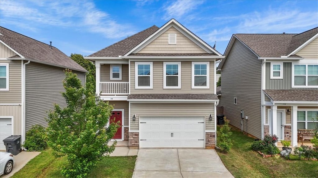 144 Adger Rd, Pendleton, SC 29670 - craftsman-style house with concrete driveway, an attached garage, roof with shingles, and stone siding