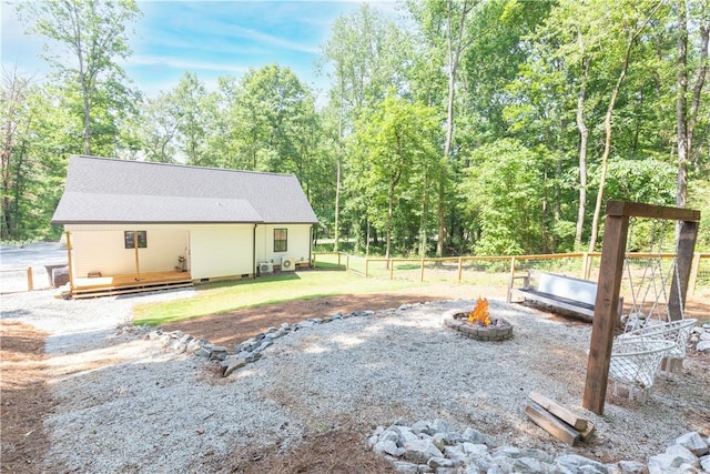 226 Edgewood Dr, Seneca, SC 29678 - view of yard featuring a fire pit and a wooden deck