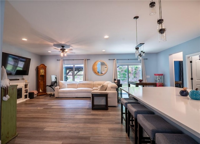 1019 Glen Rd, Seneca, SC 29672 - living room with plenty of natural light, dark wood-style flooring, recessed lighting, ceiling fan, and a fireplace with raised hearth