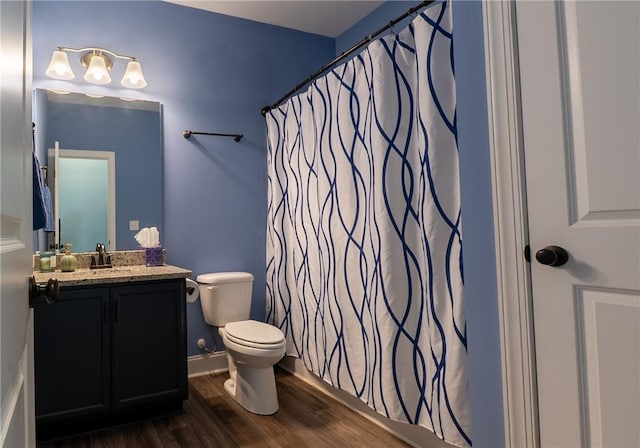 1019 Glen Rd, Seneca, SC 29672 - full bathroom with wood finished floors, toilet, vanity, and a shower with curtain