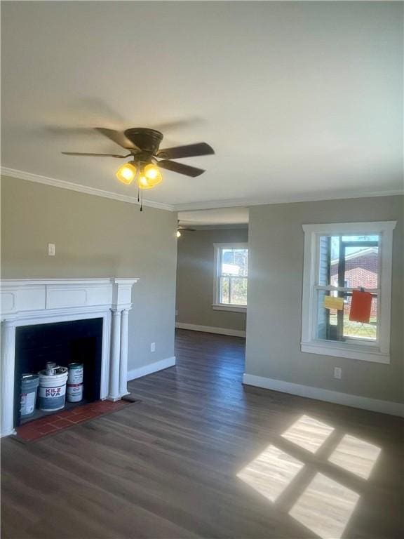 403 E S 5th St, Seneca, SC 29678 - unfurnished living room with baseboards, crown molding, dark wood-type flooring, and ceiling fan