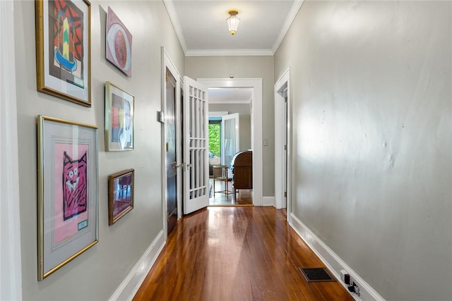 227 S Main St, Honea Path, SC 29654 - hallway with hardwood / wood-style flooring, baseboards, and crown molding