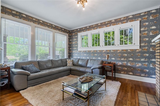 227 S Main St, Honea Path, SC 29654 - living area featuring wallpapered walls, hardwood / wood-style floors, baseboards, and ornamental molding