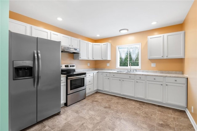 14 Smith Cir, Liberty, SC 29657 - kitchen with stainless steel appliances, under cabinet range hood, a sink, light countertops, and recessed lighting