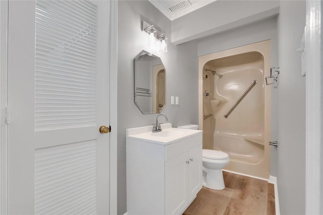 133 Cherokee Rd, Easley, SC 29642 - bathroom featuring a shower, toilet, wood finished floors, and vanity