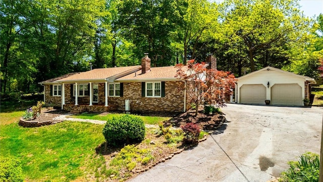 133 Cherokee Rd, Easley, SC 29642 - ranch-style home featuring a garage, a chimney, a front lawn, an outbuilding, and brick siding