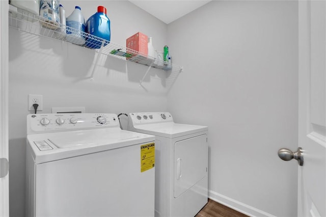 5990 Old Pearman Dairy Rd, Anderson, SC 29625 - washroom with separate washer and dryer, wood finished floors, and baseboards