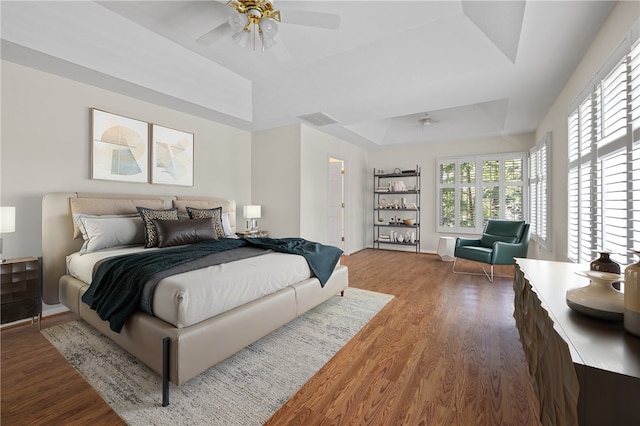 118 Pinnacle Pointe Dr, Seneca, SC 29672 - bedroom featuring a raised ceiling, wood finished floors, baseboards, and a ceiling fan