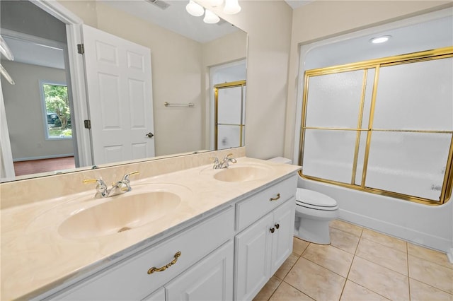 118 Pinnacle Pointe Dr, Seneca, SC 29672 - full bath with double vanity, tile patterned flooring, toilet, and combined bath / shower with glass door