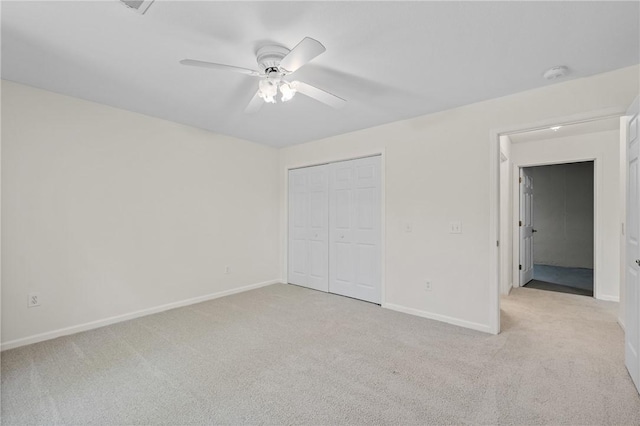118 Pinnacle Pointe Dr, Seneca, SC 29672 - unfurnished bedroom with light colored carpet, baseboards, a closet, and a ceiling fan