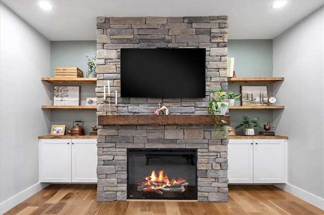 99 Starboard Tack Dr, Salem, SC 29676 - detailed view of a fireplace, wood finished floors, and recessed lighting