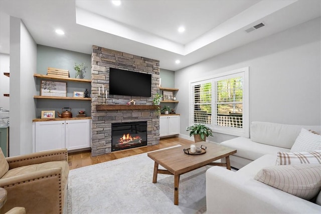 99 Starboard Tack Dr, Salem, SC 29676 - living area with light wood-type flooring, a fireplace, a tray ceiling, and recessed lighting
