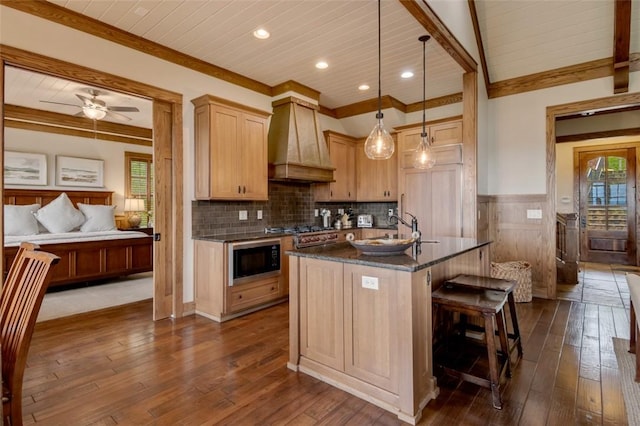 143 Button Bush Trl, Six Mile, SC 29682 - kitchen with premium range hood, built in appliances, wooden ceiling with exposed beams, dark wood-type flooring, and wainscoting