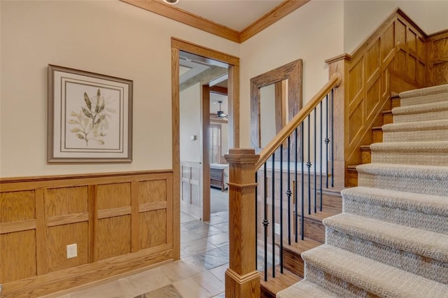 143 Button Bush Trl, Six Mile, SC 29682 - stairway featuring crown molding and wainscoting